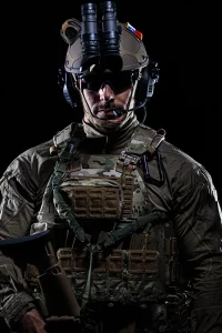Soldier wearing NFM's THOR Load Bearing System & HJELM Helmet